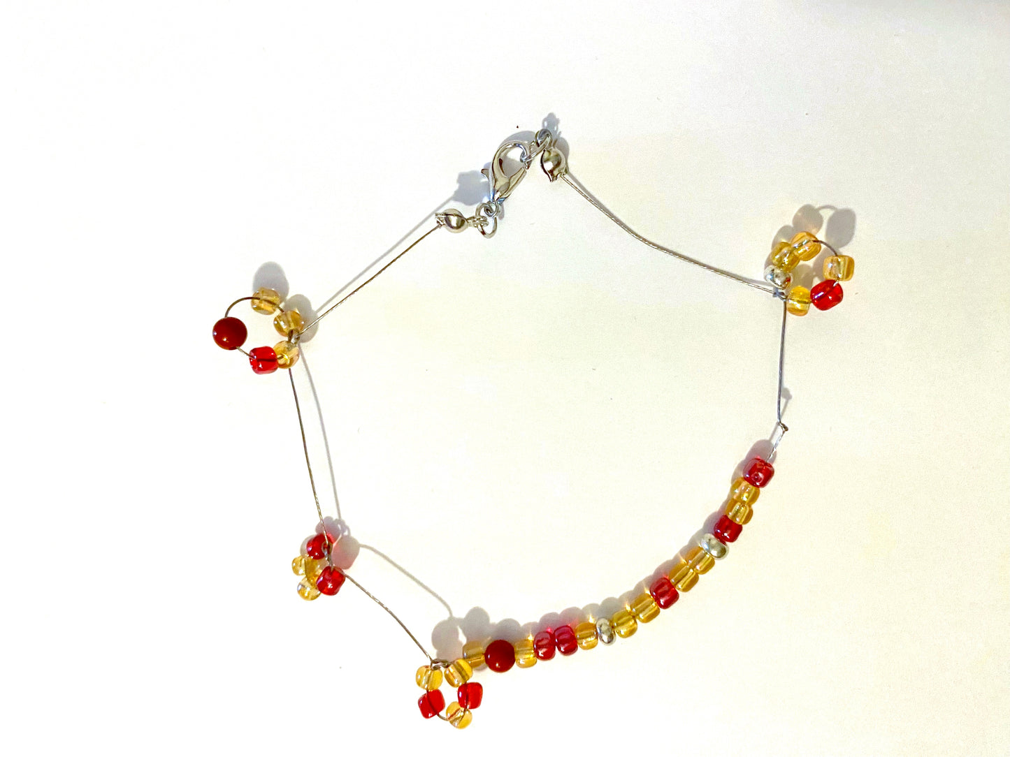 Pale Yellow Red Beaded Circle Bracelet