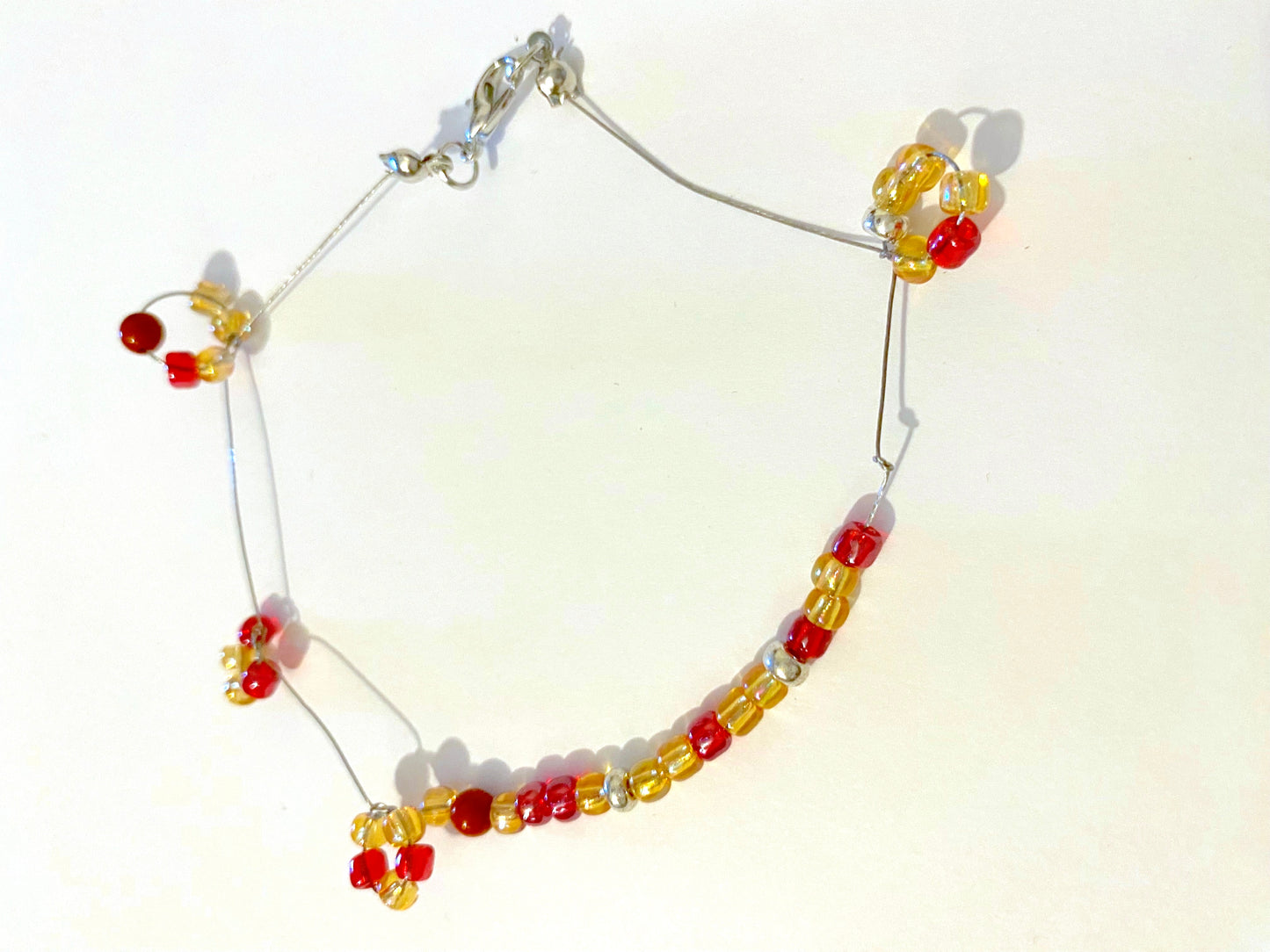 Pale Yellow Red Beaded Circle Bracelet