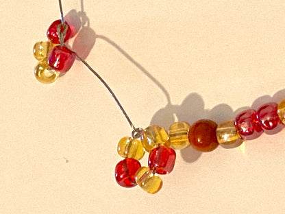 Pale Yellow Red Beaded Circle Bracelet